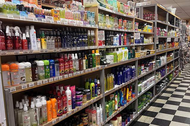 Hair care aisle at Beauty Time with shampoos, oils and edge control
