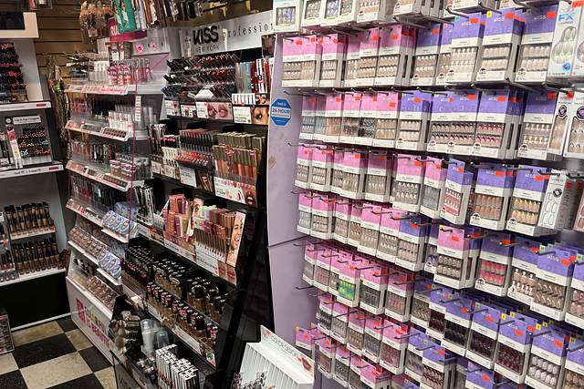 Makeup, press-on nails and lashes display at Beauty Time